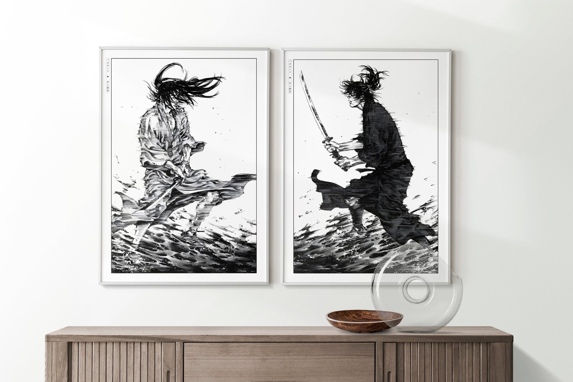 Add style to your space with the Set of 2 Vagabond Manga Wall Art. Featuring iconic characters like Miyamoto Musashi and Sasaki Kojiro, perfect for any room.